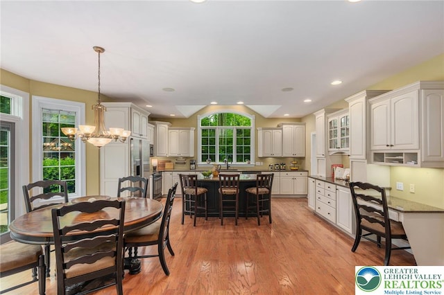 6335 Sweetbriar Ln, Upper Milford Twp, PA 18092 - dining room with light wood-style floors, a chandelier, and recessed lighting