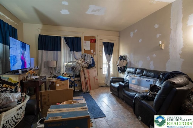 719 N 11th St, Allentown City, PA 18102 - living room featuring tile patterned floors