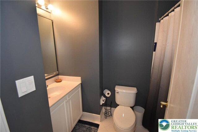 55 Forrest Stand Dr, Easton, PA 18042 - full bath with vanity, toilet, tile patterned floors, and baseboards