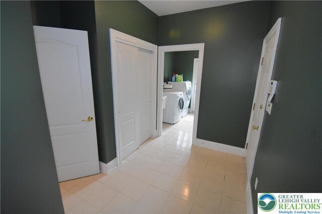 55 Forrest Stand Dr, Easton, PA 18042 - hallway featuring washing machine and dryer, baseboards, and light tile patterned flooring