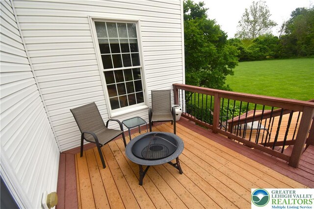 55 Forrest Stand Dr, Easton, PA 18042 - wooden terrace with a yard and a fire pit