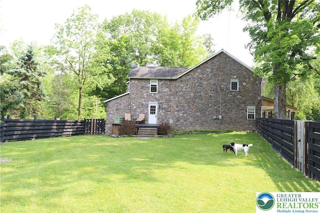 118 Burgoon Rd, Stroud Twp, PA 18301 - rear view of property featuring stone siding