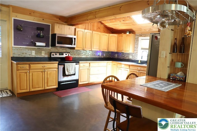 118 Burgoon Rd, Stroud Twp, PA 18301 - kitchen with appliances with stainless steel finishes, finished concrete flooring, decorative backsplash, and beam ceiling