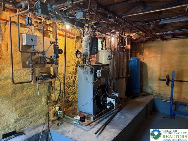 118 Burgoon Rd, Stroud Twp, PA 18301 - utility room with a heating unit