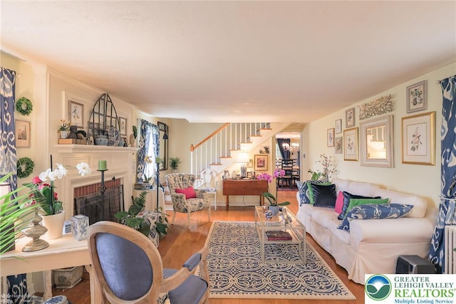 6650 Mountain Rd, Macungie Boro, PA 18062 - living area with stairs, wood finished floors, and a fireplace