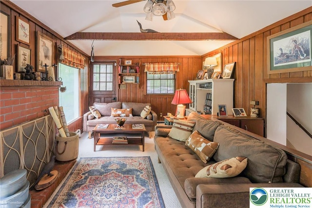 6650 Mountain Rd, Macungie Boro, PA 18062 - living area with wooden walls, vaulted ceiling, and ceiling fan