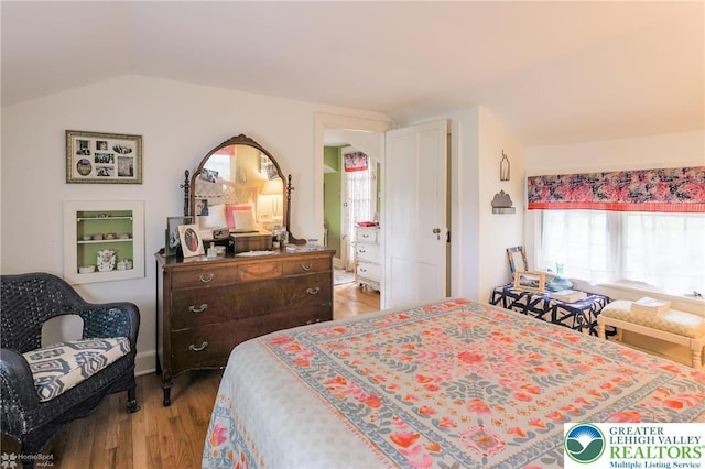 6650 Mountain Rd, Macungie Boro, PA 18062 - bedroom with wood finished floors and lofted ceiling