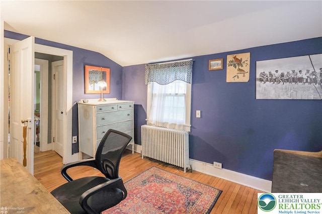 6650 Mountain Rd, Macungie Boro, PA 18062 - office area featuring radiator, wood-type flooring, and vaulted ceiling