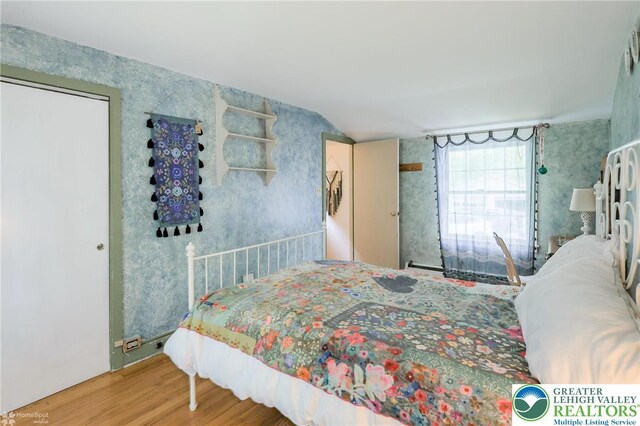 6650 Mountain Rd, Macungie Boro, PA 18062 - bedroom featuring wood finished floors and lofted ceiling