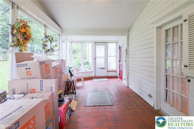 6650 Mountain Rd, Macungie Boro, PA 18062 - sunroom / solarium with plenty of natural light, wood walls, vaulted ceiling, and tile patterned floors