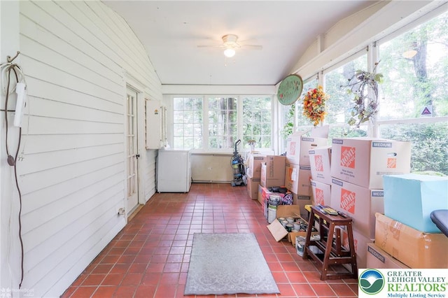 6650 Mountain Rd, Macungie Boro, PA 18062 - sunroom with vaulted ceiling, tile patterned flooring, healthy amount of natural light, and washer / clothes dryer