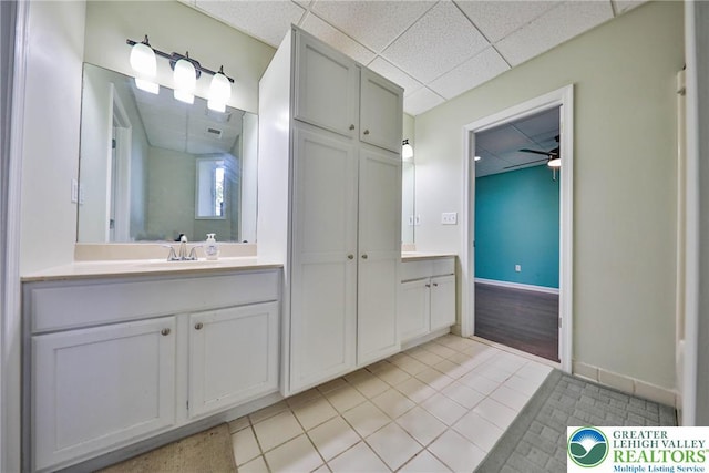 205 Osprey Way, Middle Smithfield Twp, PA 18302 - bathroom with vanity, a paneled ceiling, ceiling fan, and tile patterned flooring