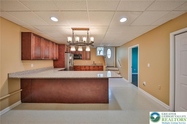 205 Osprey Way, Middle Smithfield Twp, PA 18302 - kitchen with stainless steel refrigerator with ice dispenser, black microwave, light countertops, a peninsula, and recessed lighting