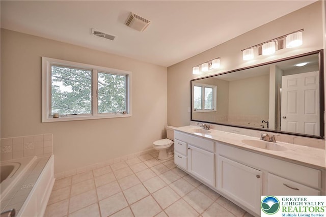 205 Osprey Way, Middle Smithfield Twp, PA 18302 - full bath with double vanity, healthy amount of natural light, a garden tub, and tile patterned floors