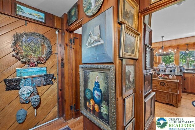 1341 Beaver Valley Rd, Hamilton Twp, PA 18360 - hall featuring light wood-type flooring and wooden walls