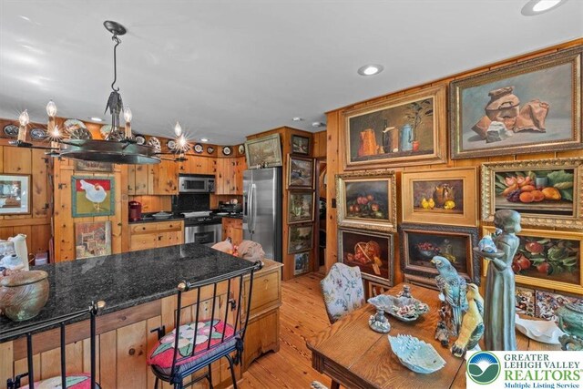 1341 Beaver Valley Rd, Hamilton Twp, PA 18360 - kitchen with appliances with stainless steel finishes, recessed lighting, light wood-style floors, brown cabinetry, and glass insert cabinets