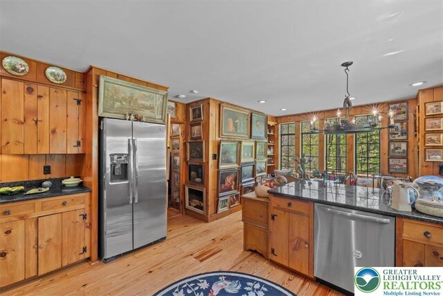 1341 Beaver Valley Rd, Hamilton Twp, PA 18360 - kitchen with stainless steel appliances, light wood-type flooring, brown cabinetry, decorative light fixtures, and recessed lighting