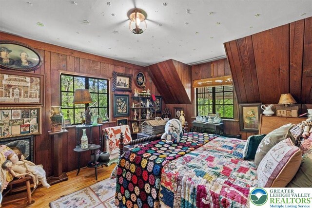 1341 Beaver Valley Rd, Hamilton Twp, PA 18360 - bedroom with wooden walls and wood finished floors