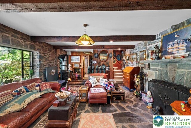 1341 Beaver Valley Rd, Hamilton Twp, PA 18360 - living area with beamed ceiling and a fireplace