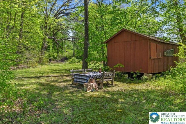 1341 Beaver Valley Rd, Hamilton Twp, PA 18360 - view of grassy yard featuring an outbuilding