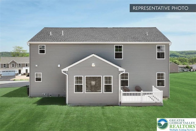 2010 Settlers Ridge Rd Lot 4, North Whitehall Twp, PA 18080 - rear view of house with a lawn and a deck