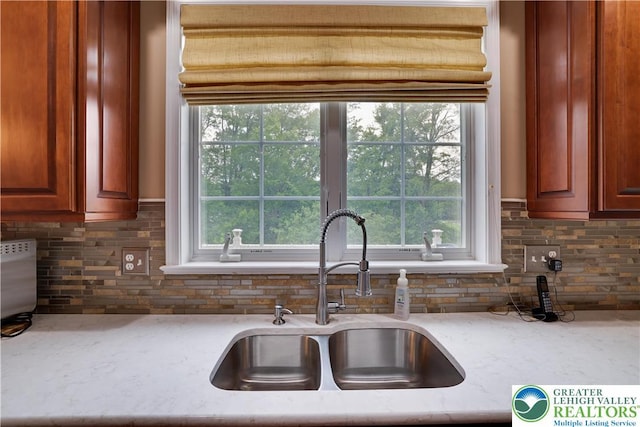 638 Stratton Dr, Middle Smithfield Twp, PA 18302 - kitchen featuring decorative backsplash and light stone countertops
