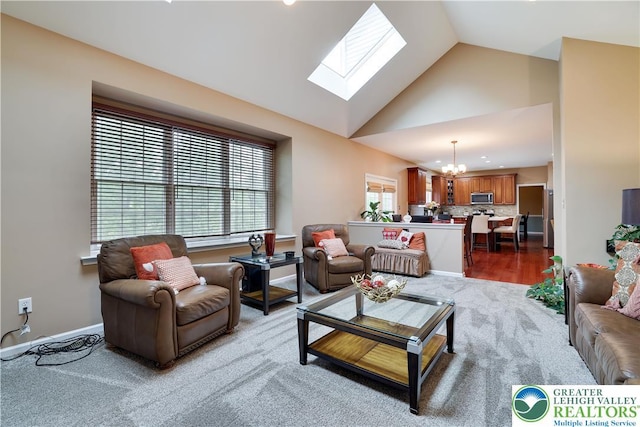 638 Stratton Dr, Middle Smithfield Twp, PA 18302 - living room featuring a chandelier, a skylight, carpet, recessed lighting, and high vaulted ceiling