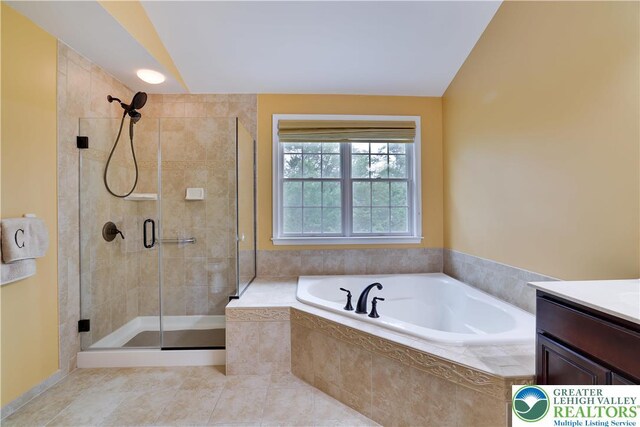 638 Stratton Dr, Middle Smithfield Twp, PA 18302 - bathroom with a bath, a stall shower, vanity, and tile patterned floors