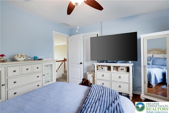 638 Stratton Dr, Middle Smithfield Twp, PA 18302 - bedroom featuring a ceiling fan and dark wood-style flooring