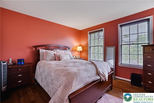 638 Stratton Dr, Middle Smithfield Twp, PA 18302 - bedroom with wood finished floors and multiple windows