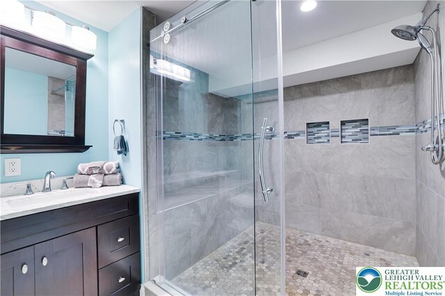 638 Stratton Dr, Middle Smithfield Twp, PA 18302 - full bathroom with a stall shower and vanity