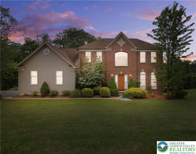 638 Stratton Dr, Middle Smithfield Twp, PA 18302 - colonial house featuring a yard and brick siding