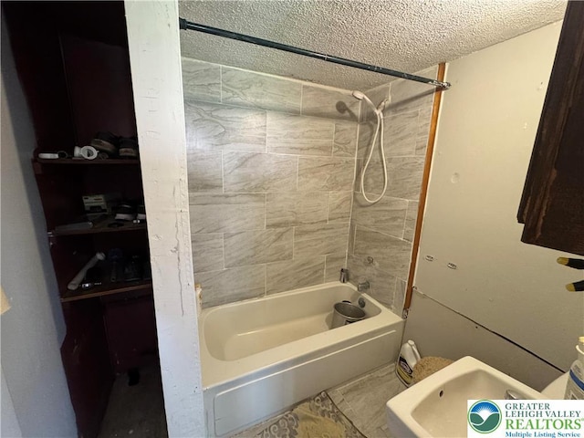226 E Snyder Ave, Lansford Boro, PA 18232 - bathroom with bathing tub / shower combination and a textured ceiling