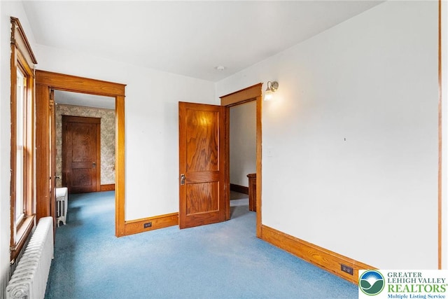 100 E Mahoning Dr, Mahoning Twp, PA 18235 - unfurnished bedroom featuring radiator and carpet