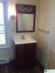 526 W Gordon St Unit 1, Allentown City, PA 18102 - bathroom with vanity and a baseboard heating unit