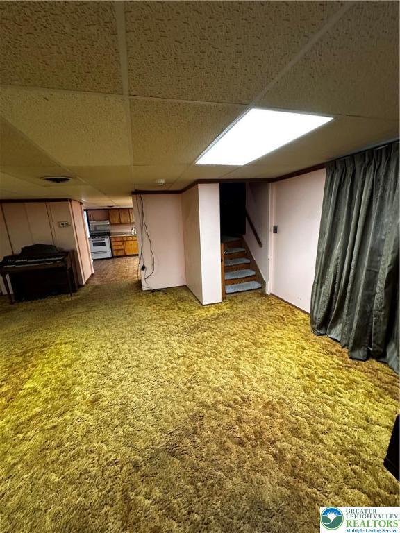 701 N Lacrosse St, Allentown City, PA 18109 - finished basement featuring a drop ceiling and stairway