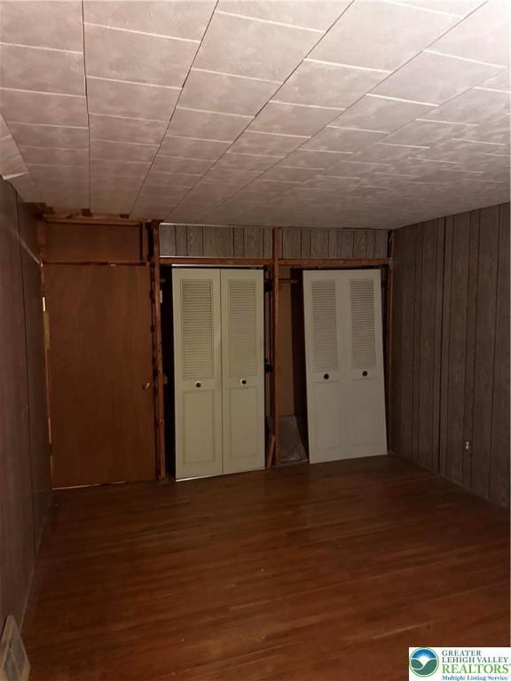 701 N Lacrosse St, Allentown City, PA 18109 - basement featuring wood finished floors and wooden walls