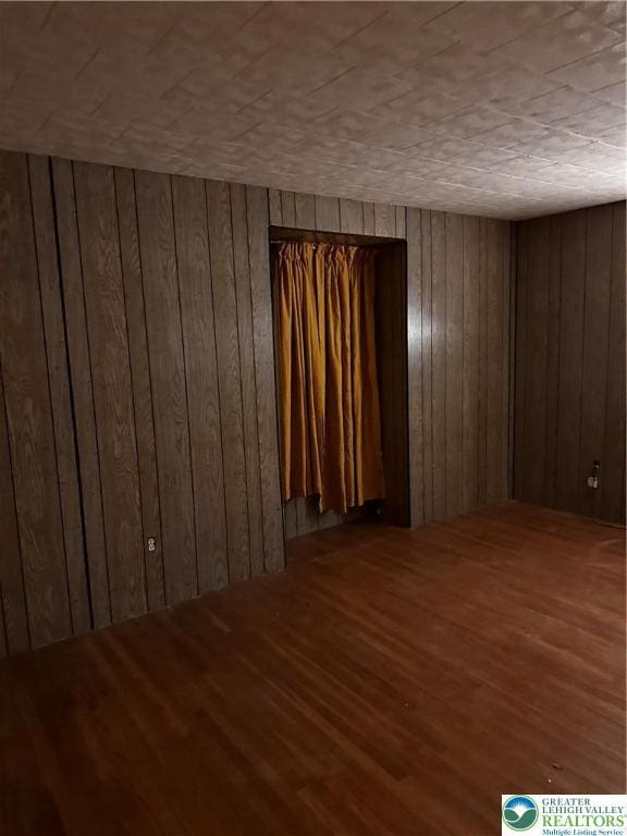 701 N Lacrosse St, Allentown City, PA 18109 - unfurnished room with wood walls, wood finished floors, and wood ceiling