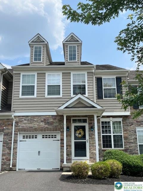 4549 Woodbrush Way, Upper Macungie Twp, PA 18104 - multi unit property with a garage, stone siding, and driveway