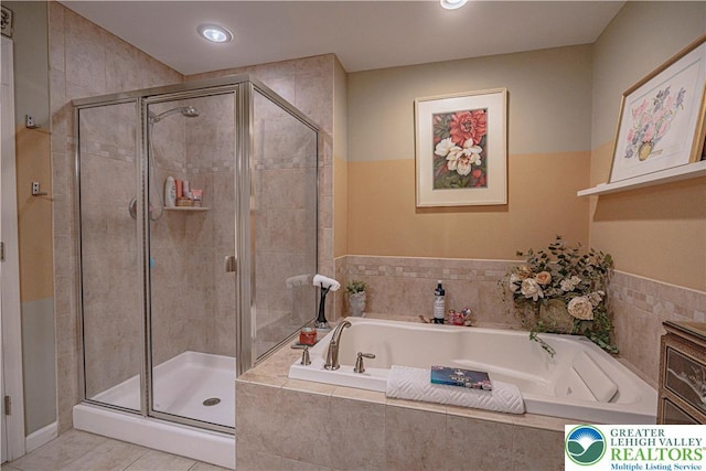 4549 Woodbrush Way, Upper Macungie Twp, PA 18104 - bathroom with a stall shower, a bath, tile patterned floors, and recessed lighting