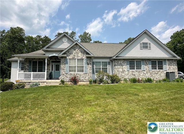 1437 Nectarine Rd, Lehigh Twp, PA 18038 - view of front of house with stone siding, a porch, and a front lawn