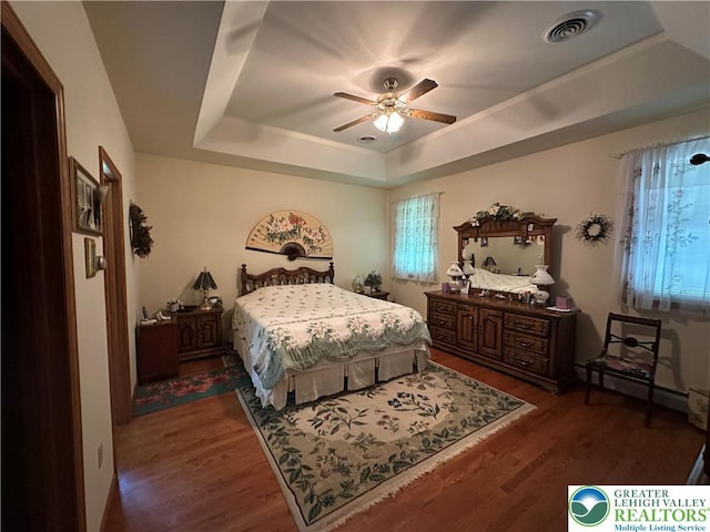 1437 Nectarine Rd, Lehigh Twp, PA 18038 - bedroom with a raised ceiling, wood finished floors, ceiling fan, and baseboard heating