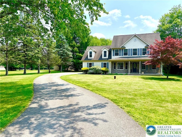 538 Carney Rd, Polk Twp, PA 18071 - view of front of house with a front yard, covered porch, and driveway
