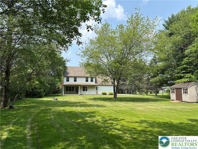 538 Carney Rd, Polk Twp, PA 18071 - view of green lawn featuring a storage unit