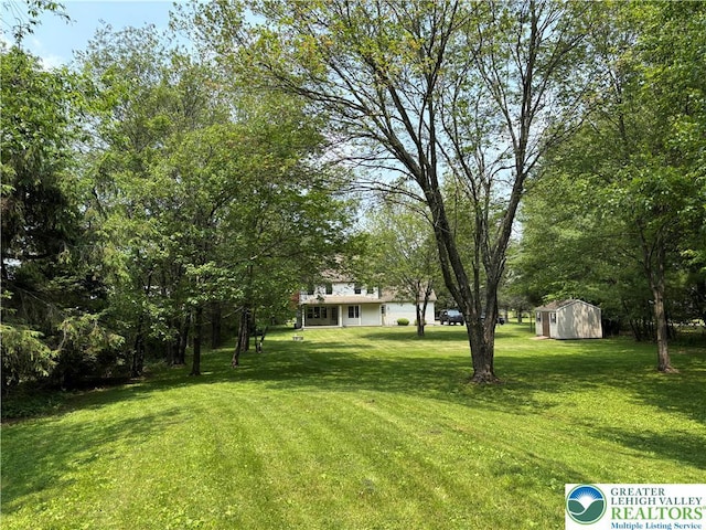 538 Carney Rd, Polk Twp, PA 18071 - view of grassy yard with a storage unit