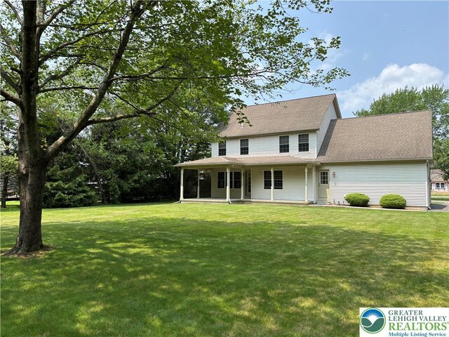 538 Carney Rd, Polk Twp, PA 18071 - back of property featuring a yard and roof with shingles