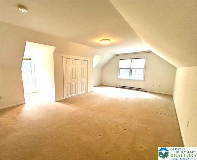 538 Carney Rd, Polk Twp, PA 18071 - additional living space with a baseboard heating unit, carpet, and vaulted ceiling