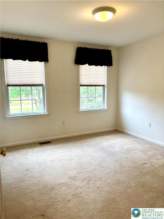 538 Carney Rd, Polk Twp, PA 18071 - carpeted empty room featuring baseboards