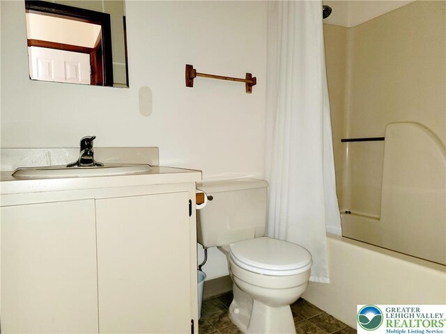 115 Foxfire Unit 306, Mount Pocono Boro, PA 18334 - bathroom with vanity, shower / bath combo with shower curtain, and tile patterned flooring