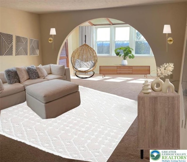 115 Foxfire Unit 306, Mount Pocono Boro, PA 18334 - living area with carpet floors, arched walkways, and a textured ceiling